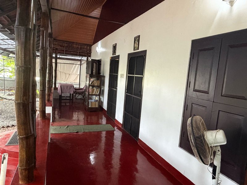 Covered bamboo veranda at Gowrisankara Ayurvedic centre Kerala