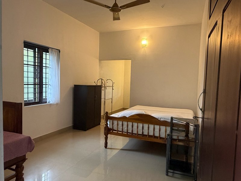 Comfortable guest room at Gowrisankara House of Ayurveda