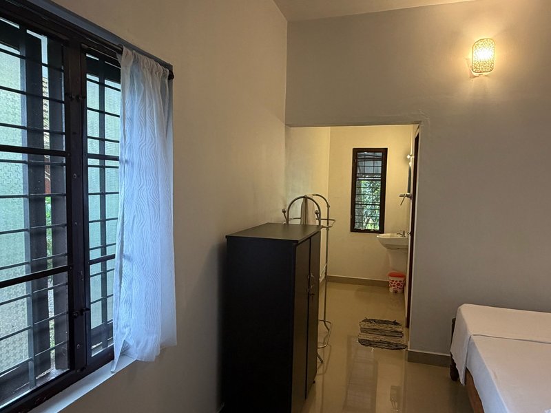 En-suite guest room at Gowrisankara Ayurvedic retreat