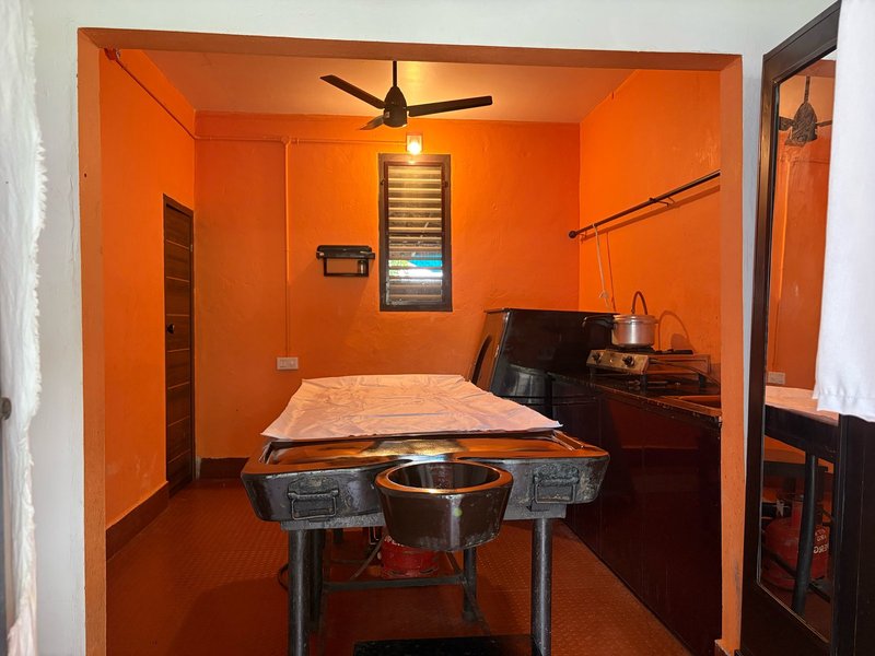 Massage treatment room at Gowrisankara House of Ayurveda